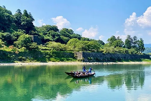 See the Stone Walls of Hitoyoshi Castle by Boat  Take a Leisurely Boat Tour Along the Kuma River